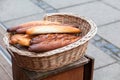 French baguettes in a wicker basket. Outdoor Royalty Free Stock Photo