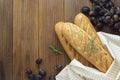 French baguettes on wooden table, rustic style. Pastry, breakfast, bread for sandwich , copy space Royalty Free Stock Photo