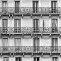 French balconies with decorative railings and tall windows