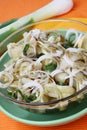 French beans salad with cut fresh spring onion rin