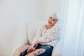 French blonde in a white room white Royalty Free Stock Photo
