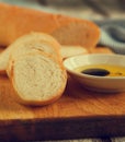 French bread baguette and olive oil. Royalty Free Stock Photo