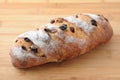 French bread with raisin isolated on cutting board Royalty Free Stock Photo