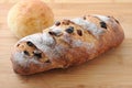 French bread with raisin isolated on cutting board Royalty Free Stock Photo