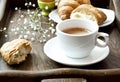 French Breakfast with Coffee, Flower and Croissants Royalty Free Stock Photo