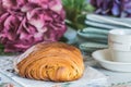 French breakfast: croissant and coffee on a kitchen table Royalty Free Stock Photo