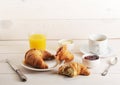 French Breakfast - croissant, jam, butter, orange juice and coffee Royalty Free Stock Photo