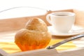 French Brioche and white cup of Coffee