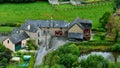 French Brittany typical countryside houses. Stone builts and slate roofs, in a green environment