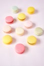 French cake macaron. Set of cute sweets on pastel pink background. almond cookies, pastel colors, top view Royalty Free Stock Photo