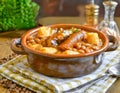 French Cassoulet. Hearty French sausage and bean stew with a crispy breadcrumb topping