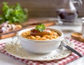 French Cassoulet. Hearty French sausage and bean stew with a crispy breadcrumb topping