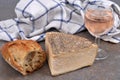 Tomme De Savoie With A Glass Of Wine And Bread Close-up
