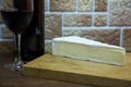 French cheese on a cutting board close up Royalty Free Stock Photo