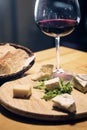 French cheese red wine and bread platter Royalty Free Stock Photo