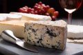French cheeses plate in assortment, blue cheese, brie, munster, Royalty Free Stock Photo
