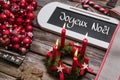 French christmas card with four red burning candles in red.