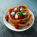 French cinnamon toast with blueberries, raspberries, maple syrup and coffee. morning breakfast Royalty Free Stock Photo