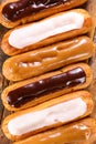French coffee, vanilla and chocolate eclair Royalty Free Stock Photo