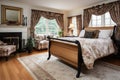 french country bedroom with wooden sleigh bed Royalty Free Stock Photo