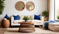 French country farmhouse home interior design of modern living room. Wicker round coffee table near white sofa with blue pillows Royalty Free Stock Photo