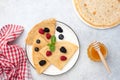 French Crepes With Berries And Honey