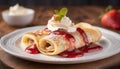 French crepes with cream cheese and whipped cream, topped with strawberry sauce, decorated with mint leaves. Royalty Free Stock Photo