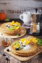 Crepes or bliny with fruits Royalty Free Stock Photo