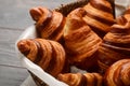 French croissants in wicker basket