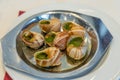 French cuisine Escargots de Bourgogne - Snails with herbs butter Royalty Free Stock Photo