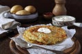 French cuisine. Pomme darphin: roasted pancakes from raw grated potatoes