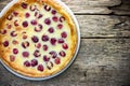 French dessert cherry clafoutis on wooden table Royalty Free Stock Photo