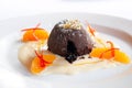 French dessert. Chocolate fondant lava cake with vanilla sauce,