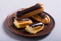 French dessert eclair with chocolate Royalty Free Stock Photo