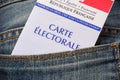 French electoral card in the rear pocket of a jeans, presidential elections concept