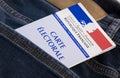 French electoral voter card official government allowing to vote paper in jeans back pocket