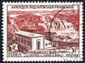 FRENCH EQUATORIAL AFRICA - CIRCA 1956: A stamp printed in France shows Boali waterfall and power station, circa 1956. Royalty Free Stock Photo