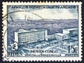 FRENCH EQUATORIAL AFRICA - CIRCA 1956: A stamp printed in France shows Brazzaville hospital at Congo, circa 1956. Royalty Free Stock Photo