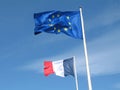 French and European flags in the sky