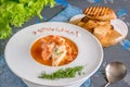 French fish soup Bouillabaisse with seafood, salmon fillet, shrimp, rich flavor, delicious dinner in a white beautiful Royalty Free Stock Photo