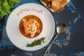French fish soup Bouillabaisse with seafood, salmon fillet, shrimp, rich flavor, delicious dinner in a white beautiful plate. Clos Royalty Free Stock Photo