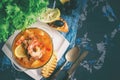 French fish soup Bouillabaisse with seafood, salmon fillet, shrimp, rich flavor, delicious dinner in a white beautiful plate. spas Royalty Free Stock Photo