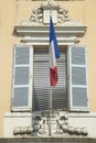 French flag flying from window, Antibes, France Royalty Free Stock Photo