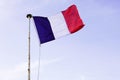 French flag of France waving over a blue sky blue white red color Royalty Free Stock Photo