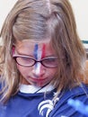 French football fans little pretty girl at France in front of the tv, during the final match of FIFA World Cup Russia 2018 France