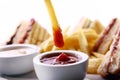 French frie wedge in a sauce