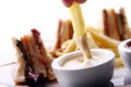 French frie wedge in a sauce
