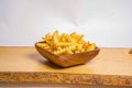 French fries with cheese sauce, potato fry on white isolated background Royalty Free Stock Photo