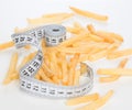 French fries chips meal with tape measure Royalty Free Stock Photo