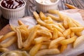 French fries chips potato and sauces on wooden background. top view Royalty Free Stock Photo